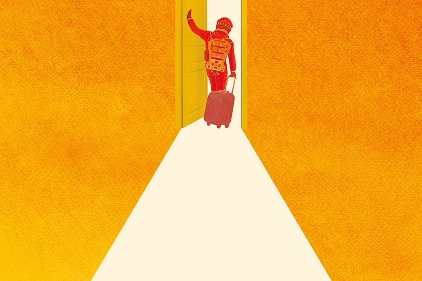 Astronauta puerta maleta